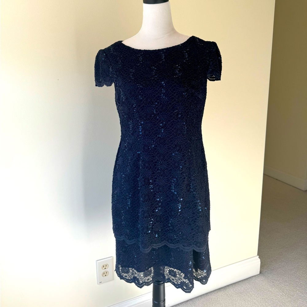 Alex Evenings dress.  Navy blue soft lace with some sequins. Size 10 petite